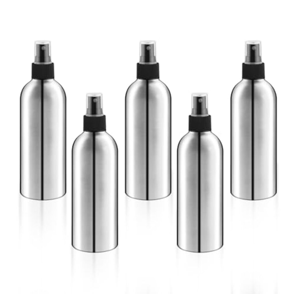 Set of five silver spray bottles with black nozzles.