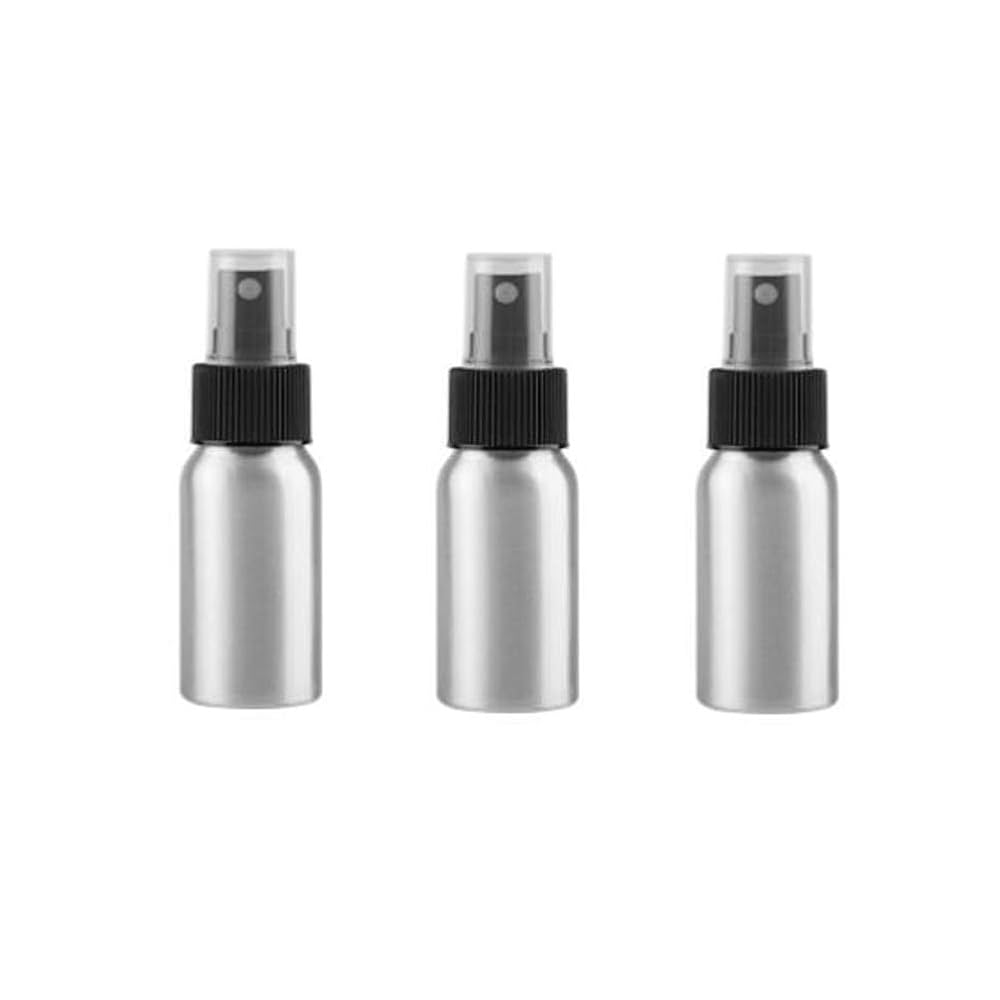 Three identical silver spray bottles with black nozzles on a white background.