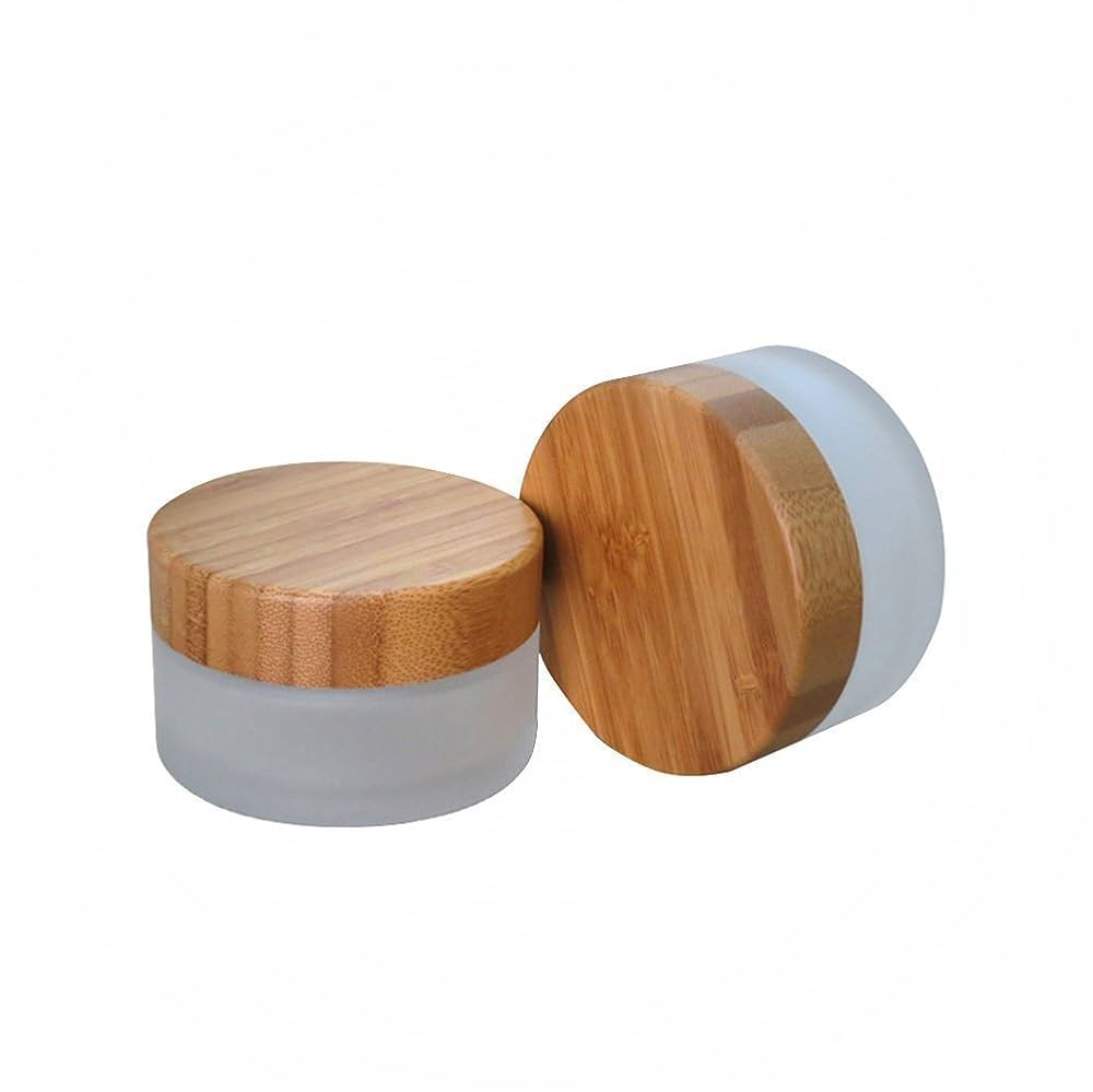 Frosted jars with wooden lids.