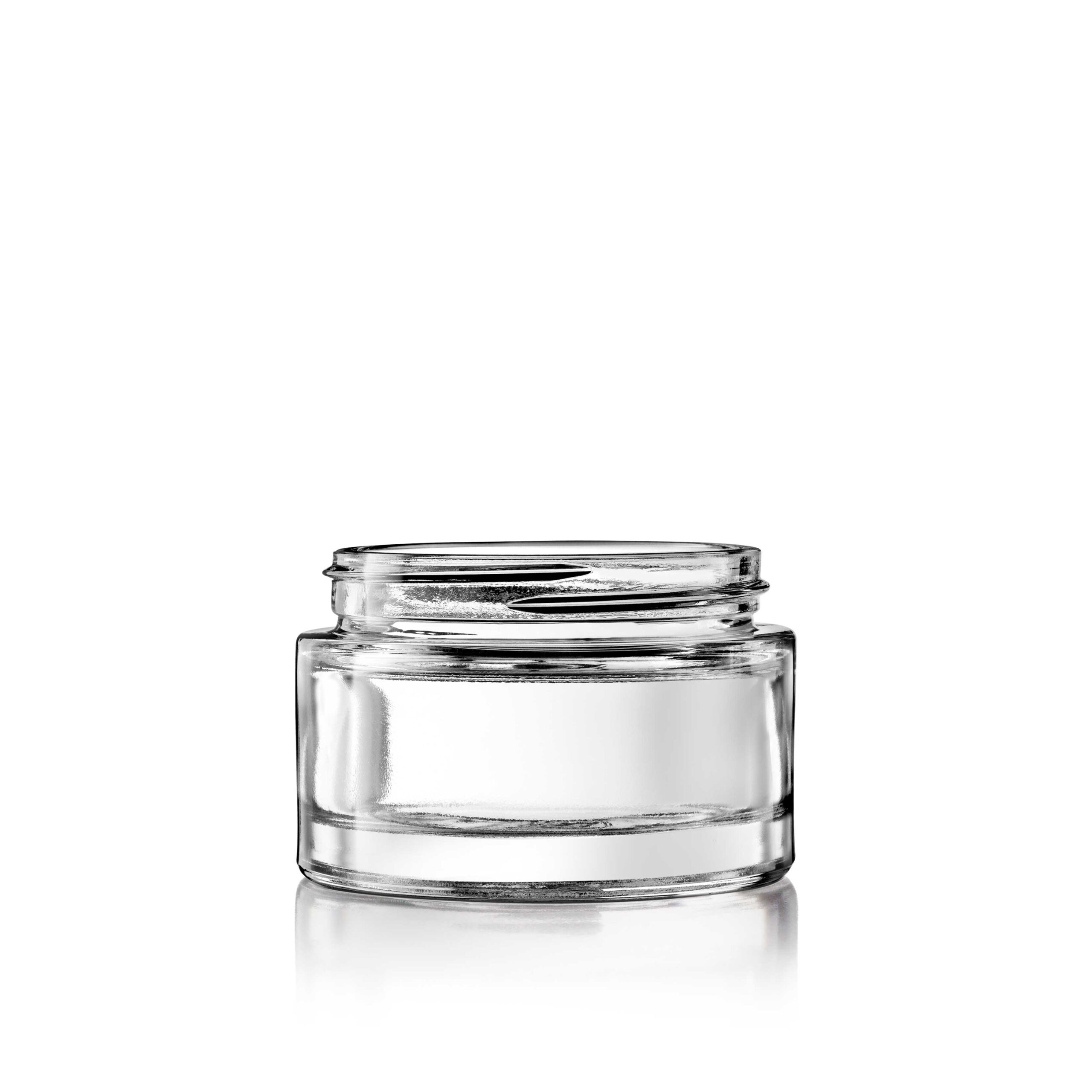Empty clear glass jar, isolated on white.
