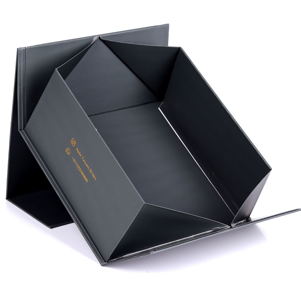 Black foldable storage box with gold text on the side.