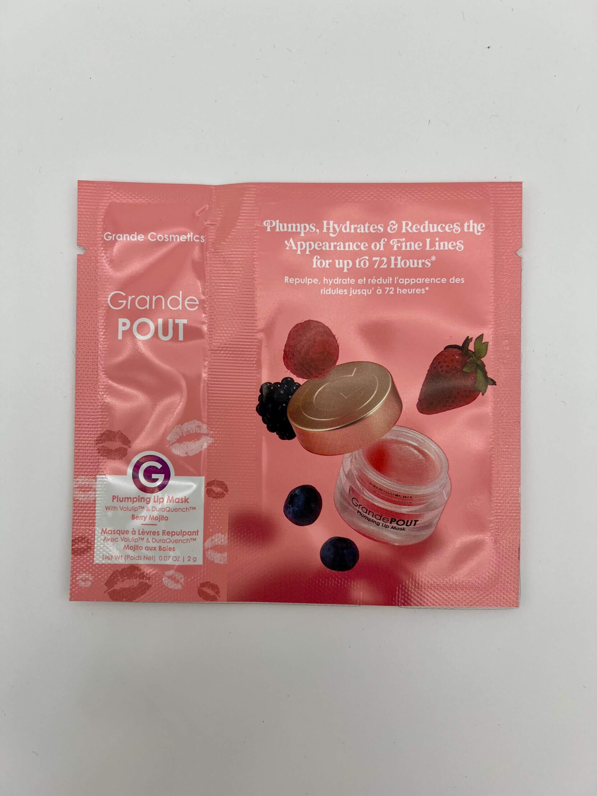 Packaging of a pink strawberry yogurt-flavored facial mask with fruit illustrations.