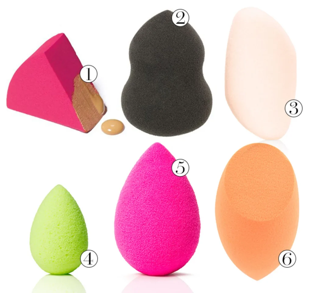 Colorful makeup sponges on a white background.