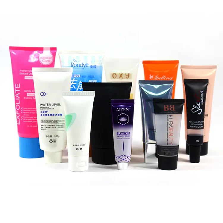 A collection of assorted skincare and cosmetic tubes arranged in a row.