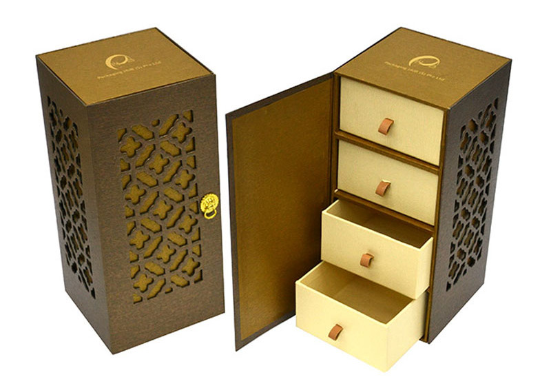 Elegant wooden jewelry box with intricate carvings and multiple drawers.