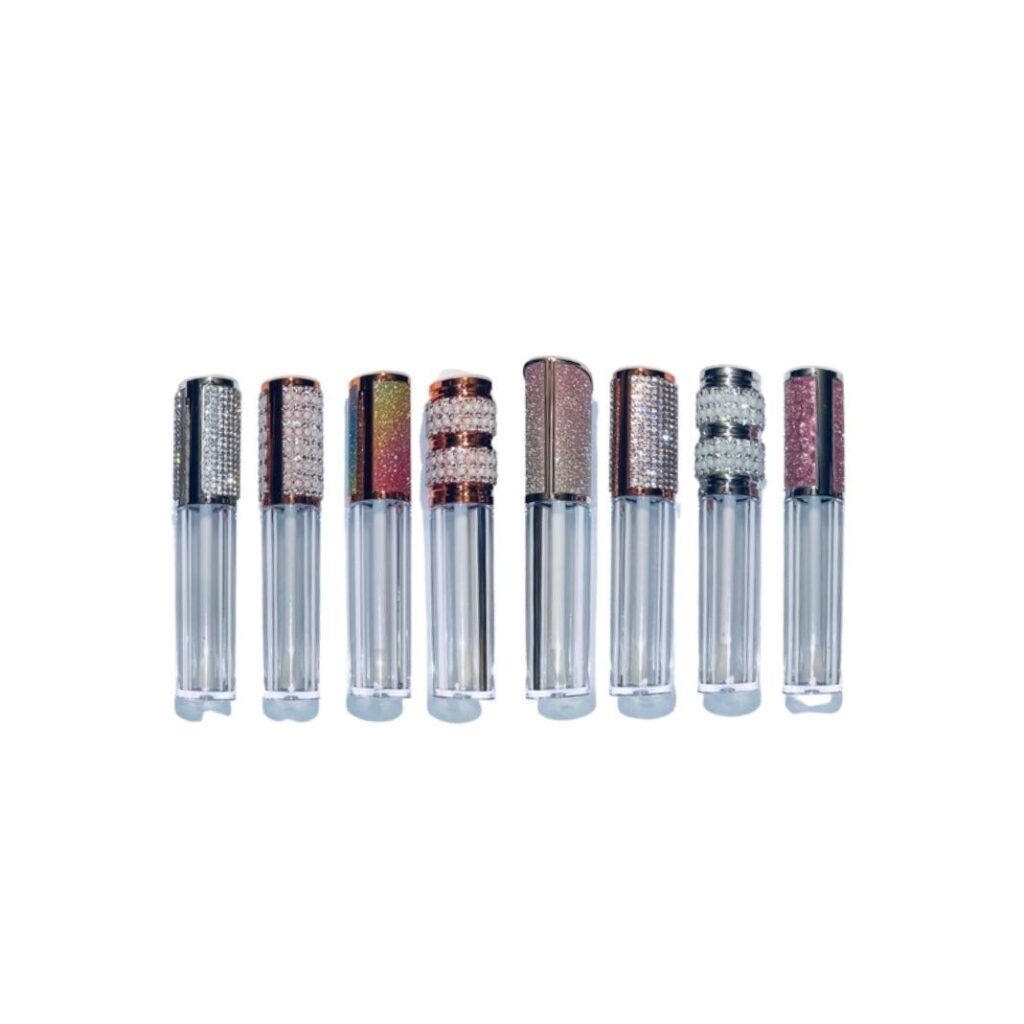 Set of eight lipsticks with varied shades and transparent bases.